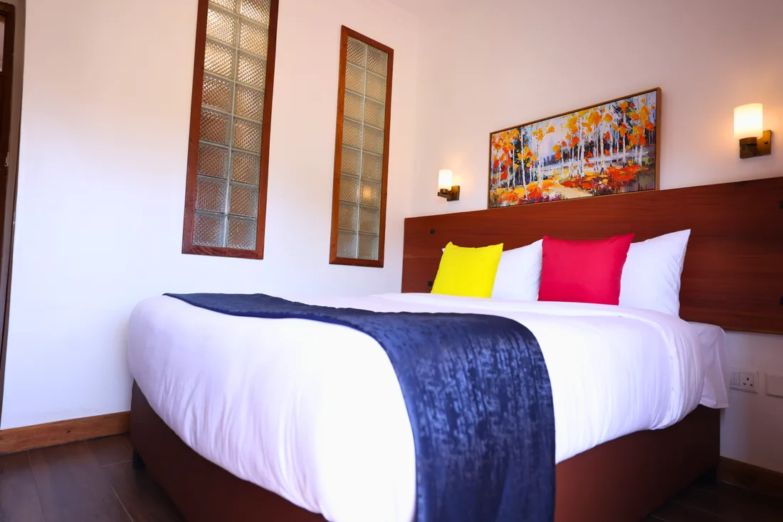 Guest room at The Eves Hotel & Suites
